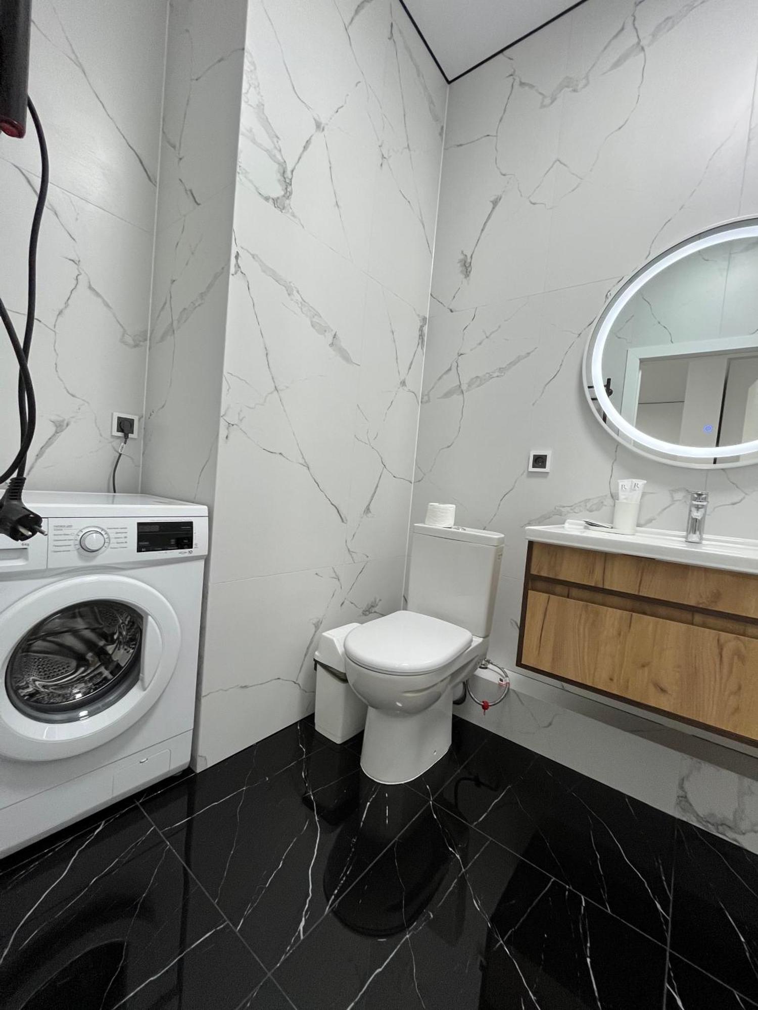 Raisson Aparthotel G32 Хан Шатыр Astana Bagian luar foto
